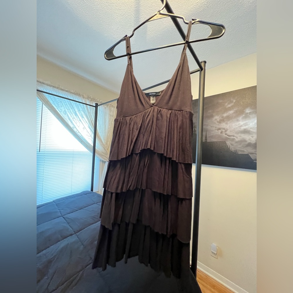 Layered strappy top or mini dress.